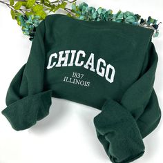 Chicago Embroidered Sweatshirt Custom City Embroidered Sweatshirts Illinois - Etsy Collegiate Custom Embroidered Sweatshirt For College, Green College Sweatshirt With Embroidered Logo, Green College Top With Letter Embroidery, Green Letter Embroidery Top For College, Winter College T-shirt With Embroidered Text, College Winter T-shirt With Embroidered Text, College Winter Sweatshirt With Custom Embroidery, Embroidered Sweatshirt, Embroidered Sweatshirts