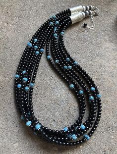 Sterling Silver Multi Strand Black Onyx with Turquoise Bead Necklace. 20 Inch Handmade Adjustable Black Turquoise Necklace, Elegant Turquoise Jewelry With Black Beads, Handmade Black Turquoise Necklace With Round Beads, Adjustable Black Beaded Turquoise Necklace, Handmade Southwestern Black Beaded Necklace, Handmade Southwestern Black Beads, Black Multi-strand Hand-strung Jewelry, Southwestern Black Round Bead Necklaces, Native American Beadwork Patterns