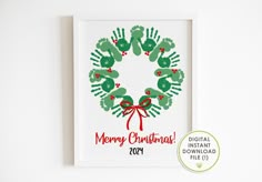 a christmas card with hand prints on it