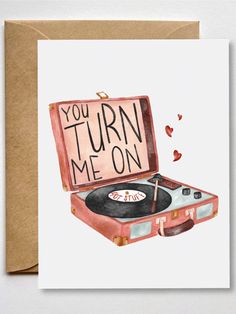 a card that says you turn me on with an old record player in the case