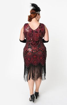 Ladies, you will love the sultry vintage-inspired Charvelle. This gorgeous Art Deco is a romantic return to the roaring 20's. The Charvelle is the perfect flapper dress available in two beautiful stunning colors. The delicate black mesh dress is awash in colored beads and sequins, finishing off with vintage-inspired black fringe. The V Neck of the dress is perfect to show off your favorite necklace or one of our charming Downton Abbey creations. Available in Black/Red and Green/Blue S-3x while s 1920s Style Fitted Dress With Beaded Fringe, Fitted Beaded Fringe Flapper Dress For Costume Party, Fitted Flapper Dress With Beaded Fringe For Costume Party, Fitted Art Deco Flapper Dress For Night Out, 1920s Fitted Dress For Night Out, Fitted 1920s Style Dress For Night Out, Vintage Fitted Embellished Flapper Dress, Vintage Embellished Fitted Flapper Dress, Red Fitted Vintage Flapper Dress