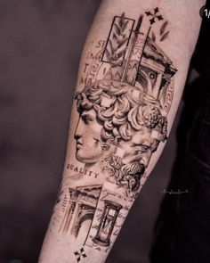 a man's arm with tattoos on it and an image of the statue of liberty