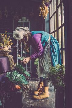 A Kim Winey Photography photo of a young girl, in a potting shed, working on a fall harvest. Lancaster County Pennsylvania, Vintage Overalls, Photography Vintage, Creative Spaces, Flowers Leaves