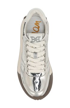 A glossy metallic finish brings eye-catching glamour to a lace-up sneaker set on a sporty textured sole. Lace-up style Synthetic upper, lining and sole Imported Silver Sneakers, Metallic Sneakers, Nordstrom Store, Sam Edelman, Anniversary Sale, Tennis Shoes, Up Styles, Womens Sneakers, Metallic Silver