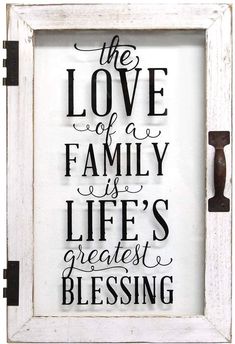 the love of a family is life's greatest blessing, framed in an old white frame