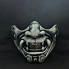 a mask with teeth and fangs on it