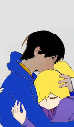 two people are hugging each other and one is wearing a blue jacket