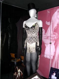 the mannequin is dressed in black and white with sequins on it