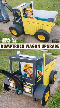 there is a cardboard dump truck with a child in it