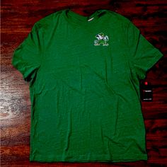 Questions? Leave A Comment Below! Casual Green T-shirt For St. Patrick's Day, Green Crew Neck Tops For St. Patrick's Day, Green Pre-shrunk T-shirt For St. Patrick's Day, Green Short Sleeve T-shirt For St. Patrick's Day, Green Cotton T-shirt For St. Patrick's Day, Irish Leprechaun, Mens Green, Leave A Comment, Notre Dame