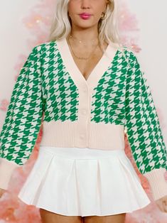 The Ellison Green Houndstooth Cardigan from Sassy Shortcake is the definition of cute and preppy. This long sleeve kelly green houndstooth cardi features a relaxed fit and button front. Also available in pink. fit: runs true to size (model wearing a size small) content: 52% acrylic, 35% cotton, 13% poly care: hand wash cold Trendy Plaid Long Sleeve Cardigan, Plaid Long Sleeve Sweater For Spring, Chic Plaid Long Sleeve Cardigan, Chic Plaid Cardigan With Long Sleeves, Preppy Long Sleeve Fall Sweater, Chic Plaid Cardigan For Spring, Plaid Long Sleeve Cardigan For Work, Winter Houndstooth Long Sleeve Cardigan, Long Sleeve Houndstooth Cardigan For Fall