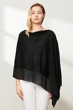 Gorgeous Bonded Knit Poncho, Shawl,  chic and  great quality! Great for the Office,  wear as a outdoor Fall shawl! In Black, Beige or Cool Grey! Like a piece  of jewelry a great buy to wear with everything you can imagine, leggings, jeans, shorts or dress.  Wool Mix (knit stretch ) Light Poncho can be worn two ways, asymetric as photo side seam along  the shoulder to hem or with the center back seam going down the back. Wool Mix 80% Acrylic 20% Wool Machine Washable Gentle Cycle or Hand Wash Col Bohemian Shawl For Fall Layering, Black Casual Shawl For Fall, Casual Black Shawl For Fall, Black Bohemian Shawl For Fall, Oversized Shawl Poncho, Black Bohemian Shawl For Spring, Oversized Black Shawl For Fall, Shawl For Layering, Chic Shawl For Fall Layering