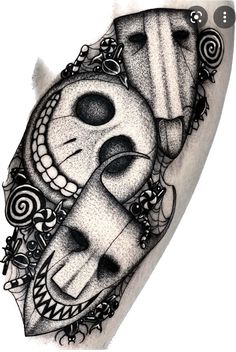 a black and white tattoo design on the leg