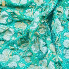 Embrace elegance with our Georgette Handloom Banarasi Bandhani Dupatta. This exquisite piece combines the traditional charm of Banarasi weaving with the vibrant allure of Bandhani, creating a timeless accessory. Traditional Turquoise Dupatta With Intricate Embroidery, Traditional Turquoise Embroidered Dupatta, Green Brocade Saree With Resham Embroidery, Elegant Brocade Dupatta With Intricate Embroidery, Elegant Multicolor Embroidered Dupatta For Reception, Elegant Brocade Embroidered Fabric For Reception, Brocade Embroidered Dupatta Fabric For Reception, Elegant Brocade Saree With Resham Embroidery, Elegant Multicolor Embroidered Silk Fabric