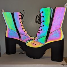 These Are New Ocho Toros Platform Boots With An Inside Zip, Decorative Spikes, A Chunky Heel, And Made Of A Reflective Material That Lights Up In Amazing Rainbow Colors When Hit With A Flash. Size 6 But A Decently Generous 6, I Normally Wear 6.5 And These Were Comfortable. These Also Have A Generous Shaft Size, And Rise ~7.5" Up The Leg. Under Most Lighting Conditions, These Boots Look Grey Or A Greenish-Pinkish-Grey, They Only Display This Rainbow Color With A Flash. These Have Been Tried On In Casual Pink Lace-up Heels, Pink Ankle-high Synthetic Heels, High-top Chunky Platform Heels In Synthetic, Multicolor Platform Lace-up Heels, Rainbow Platform Heels With Round Toe, Rainbow Round Toe Platform Heels, Pink Synthetic Boots For Summer, Pink Synthetic Summer Boots, Pink Lace-up Heels With Reinforced Heel