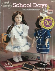 two dolls standing next to each other in front of a book with the title school days crocheted dresses for doll dolls