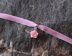 "Floral velvet light pink ribbon choker with sculpted pink pearl rose. Material of rose is polymer clay with the pearl cover. Each petal of flower made by hand Dia flower about 12 mm/0.4\" Length of necklace is adjustable: 10-12 inches/ 25,4 - 30,5 cm 11-13 inches/ 28-33 cm 12-14 inches/ 30.5- 35.5 cm 13-15 inches/ 33-38 cm 14-16 inches/ 35.5 cm-40.5 cm 15-17 inches/ 38,1 cm- 43,2 cm 16-18 inches/ 40.6 cm- 45.7 cm 17-19 inches/ 43 cm - 48 cm 18-20 inches/ 45,5- 50.8 cm Width of ribbon 7 mm / 0.3 Adjustable Pink Necklace With Rose Design, Handmade Pink Choker As A Gift, Handmade Pink Choker As Gift, Pink Adjustable Choker As A Gift, Adjustable Pink Ribbon Necklace, Gift Rose Design Choker In Rose Color, Light Pink Ribbon, Coquette Jewelry, Pink Choker