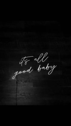 it's all good baby neon sign in black and white with handwritten text