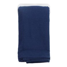 a blue towel folded on top of a white background