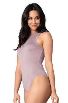 Hardly there wear. Our sleek Knit Bodysuits fit like a second skin, designed with our buttery soft lightweight jersey, a cute, high neckline, snap detailing at the crotch, and high-cut leg openings that elongate. All you’ll feel is confidence. Product Features: Ultra-Soft, Moss Jersey Fabric Barely There Feel High Neckline Snaps For Ease High-Cut Leg Openings Imported Materials and Care: 88% Polyester / 12% Spandex Machine-Wash Cold Gentle Model Measurements: Model is 5’8” and wearing a size S Lined Loungewear Bodysuit In Solid Color, Solid Color Loungewear Bodysuit With Lined Body, Solid Loungewear Bodysuit With Lined Body, Stretch Leotard For Loungewear, Stretch Bodysuit With Lined Body For Loungewear, Second-skin Bodysuit For Loungewear In Athleisure Style, Solid Color Athleisure Bodysuit For Loungewear, Smoothing Bodysuit For Loungewear, Second-skin Athleisure Bodysuit For Loungewear