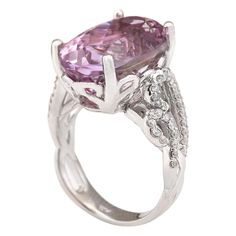 Stamped: 14K White Gold Total Ring Weight: 10.0 Grams Ring Length: N/ARing Width: N/A Gemstone Weight: Total Natural Kunzite Weight is 13.36 Carat (Measures: 17.65x10.90 mm) Color: Pink Diamond Weight: Total Natural Diamond Weight is 0.50 Carat Quantity: 54 Color: F-G, Clarity: VS2-SI1 Face Measures: 17.65x10.90 mm Sku: [703550W] Luxury White Gold Diamond Ring With Gemstone Accents, Oval Gemstones With Diamond Accents Luxury Style, Luxury White Gold Sapphire Ring With Gemstone Accents, Oval Diamond Gemstones For Formal Occasions, Formal Oval Diamond Gemstones, Luxury White Gold Rings With Gemstone Accents, Exquisite Oval Gemstones For Formal Occasions, Exquisite Oval Gemstones For Formal Events, Luxury Diamond Rings With Gemstone Accents