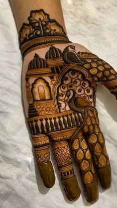 the hand is decorated with intricate designs