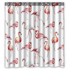 a shower curtain with pink flamingos on it