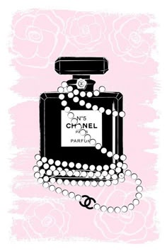 chanel perfume bottle with pearls on pink background