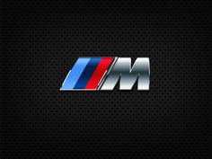 the bmw m logo on a black background