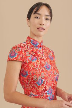 If you love this brocade fabric, but are looking for something more fun and casual, then this qipao is for you. Made as a knee-length sheath cheongsam, this cheongsam lets you show off those legs and stay cool for the summer. Traditional Short Sleeve Fitted Cheongsam, Traditional Fitted Floral Cheongsam, Traditional Fitted Floral Print Cheongsam, Festive Traditional Cheongsam With Short Sleeves, Floral Print Fitted Cheongsam For Wedding, Festive Traditional Short Sleeve Cheongsam, Floral Fitted Cheongsam For Wedding, Fitted Floral Cheongsam For Wedding, Festive Fitted Cheongsam With Short Sleeves