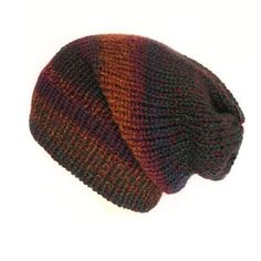 Hand-woven/knitted beanie hat - Handmade in Edinburgh, Scotland. The Pheonix chunky slouchy beanie hat. A gorgeous mix of purple, green and fiery orange.  Hand-woven on a mechanical loom with chunky acrylic wool. The wool is marbled so the colours are spread randomly throughout, making each hat unique, with a slightly different pattern, so no two hats are exactly the same.  The slouch in this hat is stretchy so you can mold it to any shape you like which makes these hats perfect for curly hair, Extravagant Clothing, Handmade Slouchy Beanie One Size, Mechanical Loom, Slouchy Multicolor Beanie Hat, Bohemian Grunge, Green Beanie, Orange Beanie, Purple Beanie Hat, One Size, Knitted Beanie Hat