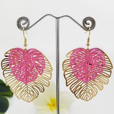 These Earrings Feature A Large Monstera Leaf Design That Measures 4.5cm Wide And A Drop Length Of 5cm Long. High Quality Gold Plated Earrings With Tarnish Resistant Ear Hooks And Wire. These Earrings Are Available In Pink, Black And Yellow Shadow Leaves. Note: These Earrings Are Large Statement Earrings. Drop Length: 5 Centimeters; Width: 4.5 Centimeters Great For Brides Maids Matching Earrings, Graduation Earrings, Party Themes, Etc. Elegant Pink Heart Metal Earrings, Pink Heart Earrings For Pierced Ears, Pink Metal Heart Earrings For Pierced Ears, Trendy Pink Heart Earrings Pierced, Pink Pierced Earrings As Gift, Trendy Pink Heart Earrings As Gift, Trendy Pink Heart Earrings For Gift, Pink Heart Earrings For Party, Pink Jewelry For Pierced Ears For Valentine's Day