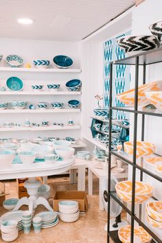 a room filled with lots of plates and bowls