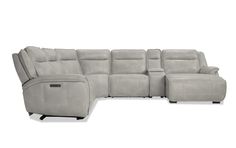 the reclining sectional sofa with power headrests and footstools is shown