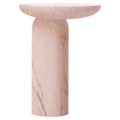 a pink marble pedestal on a white background