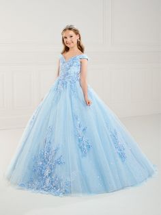 Your sweet girl will make a grand entrance in this floral applique long off the shoulder dress with A-line tulle skirt by Tiffany Princess 13744. This off the shoulder gown features a sweetheart neckline with floral lace appliques, floor length A-line tulle skirt with lace appliques, sweep train, and a lace-up back. House of Wu Tiffany Princess Collection Spring 2024 Style Number: 13744 Fabric: Tulle/Floral Lace Appliques Please note: There may be a loss of glitter while wearing this dress due t Off-shoulder Ball Gown For Prom Pageant, Off-shoulder Dresses For Prom Season Pageants, Off-shoulder Tulle Dress For Quinceanera, Long Off The Shoulder Dress, Off Shoulder Gown, Skirt With Lace, 2024 Style, Girls Formal Dresses, Princess Collection