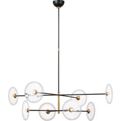 a large chandelier with glass globes hanging from it's brass frame