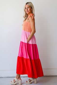 The Sunset Moments Color Block Maxi Dress is ready to make some remarkable getaway memories with you! This striking dress features a dynamic color block design, with panels of rich red, soft pink, and vibrant orange seamlessly blending together for a captivating visual impact. Crafted from high-quality fabric, this maxi dress drapes effortlessly, ensuring both comfort and style. The tiered construction adds movement and dimension, creating a graceful silhouette that flatters every figure. Whethe Maxi Dress Vacation, Sunset Party, Color Block Maxi Dress, Dress Drape, Color Block Design, Vacation Dresses, Pink Maxi Dress, Block Design, Summer Festival