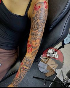 a woman with a tattoo on her arm