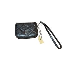 This Steve Madden Wristlet Wallet Is A Chic Companion For Any Occasion. Crafted From Luxurious Black Vegan Leather, Its Quilted Design Adds A Touch Of Elegance To Your Ensemble. The Solid Pattern Ensures Timeless Appeal, While The Wristlet Style Offers Convenience On The Go. Inside, You'll Find Ample Space For Your Essentials, Including Dedicated Credit Card Slots To Keep You Organized. Whether You're Heading To A Casual Brunch Or A Formal Event, This Wallet Is Your Perfect Partner. New With Tag Steve Madden Card Holder, Perfect Partner, Black Vegan, Wristlet Wallet, Leather Wristlet, Key Card Holder, Solid Pattern, Formal Event, Steve Madden