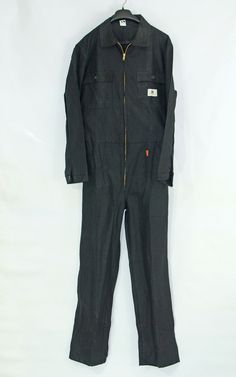 Vintage cotton Work wear Overalls  long sleeve black Jumpsuit Boiler Suit marked size 50 composition 100% cotton excellent  condition, zipper closure, 5 pockets by Reindl , ISOSPORT Sanfor measurements (laying flat) shoulders:                           50 cm or 19,75 " chest( armpit to armpit )  54 cm or 21 " waist                                    42 cm or 16,5 " adjustable to 47 cm or 18,5 "  full length                             1,61 cm or 63 " sleeve length:                     65 cm or 25,5" hips                                       53 cm or 21 "   Thigh                                 31 cm- 12,25 in  bottom  width                   25 cm - 10 in weight - 0,72 kg - 1,59 Lbs Returns & exchanges All sales are final. Due to the unique our products, we do not offer any refunds or exc Kids Overalls, Bug Boy, Boiler Suit, Vintage Cotton, Black Jumpsuit, Full Length, Overalls, Work Wear, Zipper