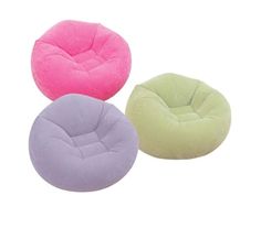 three different colored bean bags sitting next to each other