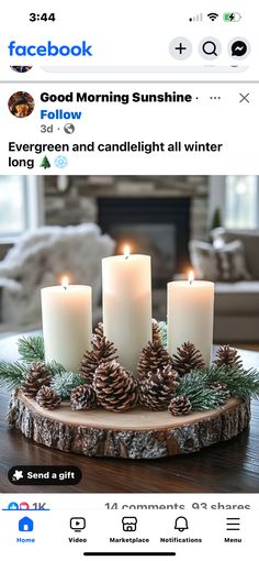 candles sitting on top of a wooden tray with pine cones and evergreen needles in front of a fireplace