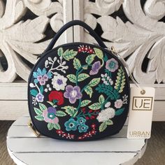 Urban Expressions Embroidered Crossbody Tote Trendy Embroidered Shoulder Bag For Spring, Embroidered Shoulder Bag For Travel In Spring, Spring Embroidered Shoulder Bag For Travel, Spring Travel Shoulder Bag With Embroidery, Embroidered Crossbody Bag For Spring, Spring Travel Bag With Embroidered Logo, Blue Bags With Floral Embroidery For Spring, Blue Embroidered Shoulder Bag For Summer, Blue Floral Embroidery Bags For Everyday Use