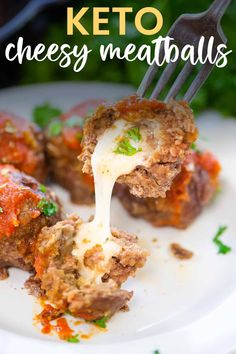 keto cheese meatballs on a white plate with a fork