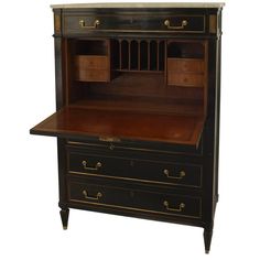 an antique desk with two drawers on top