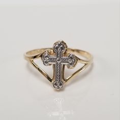 "Thanks for shopping our vintage estate store. We tend to sell well below wholesale and truly hope you enjoy all of our items. Many of the items are one of a kind, so please enjoy scrolling through the pictures and hopefully something will catch your eye. Blacks spots are from the reflections. Estate14k yellow gold cross heart filigree ring. Ring size: 7 Setting: 1/2\" Band width: 1.5mm Weight: 1.35 grams Stunning ring, marked 14k. As with most estate items there may be some wear on item. We do Heirloom Style 14k Gold Filigree Ring For Gift, Heirloom Style 14k Gold Filigree Ring As Gift, Victorian Style Gold Filigree Ring Gift, 14k Gold Hallmarked Filigree Ring As Gift, Heirloom Style Filigree Ring Stamped 14k, Heirloom Filigree Ring Stamped 14k, Heirloom Filigree Ring Stamped 14k Gift, Heirloom Style Hallmarked Filigree Ring As Gift, Vintage Filigree Ring Stamped 14k