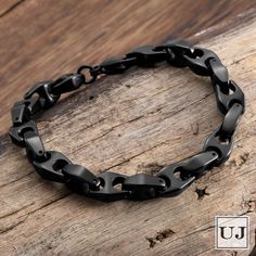 ✔ MODERN AND SLEEK ACCESSORY - Featuring the classic anchor chain link design in a polished black finish, this bracelet was designed to compliment your everyday attire. ✔ DURABLE MATERIAL - Made of solid tungsten, this bracelet was engineered to withstand the wear and tear of everyday use with exceptional resistance to scratching and tarnishing. ✔ COMFORTABLE FIT - Comfortably fits most wrist sizes with a measurement of 8.3 inch (21cm) L x 0.35 inch (0.9cm) W x 0.2 inch (0. 5m) thickness and 68g Mens Bracelet Fashion, Bracelets For Boyfriend, Urban Jewelry, Anchor Chain, Link Design, Black Tungsten, Fancy Gifts, Bracelet Chain, Unisex Bracelets