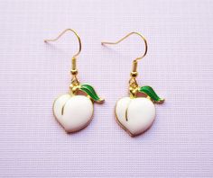 A pair of cute peach earrings Peach charm is about 2cm Comes with rubber earring backs Cute Peach, Peach Earrings, Peach Fruit, Rose Pastel, Pink Peach, Earring Backs, Pastel Pink, Jewelry Earrings Dangle, Gold Earrings