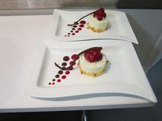 two small desserts are sitting on white plates